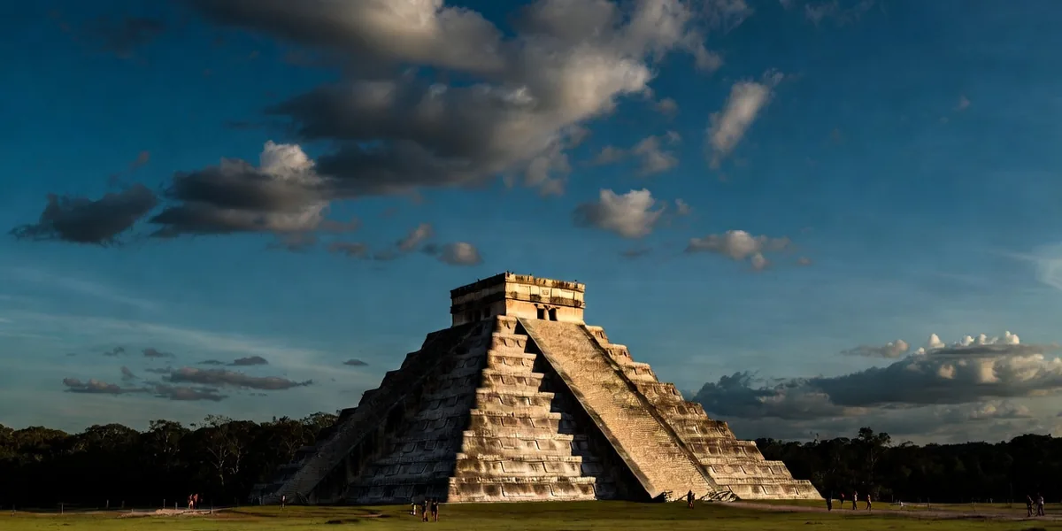 El Castillo pyramid at Chichén Itzá in early morning light with few visitors