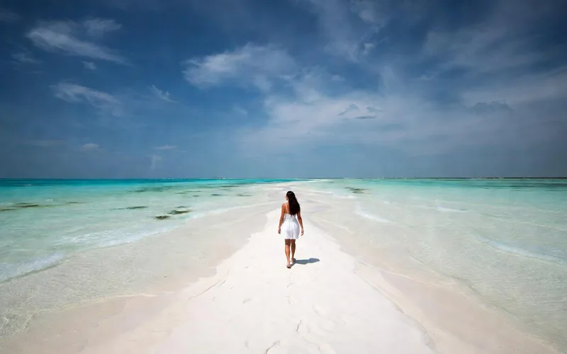 Walking the white sandbar to Punta Mosquito at low tide on Isla Holbox