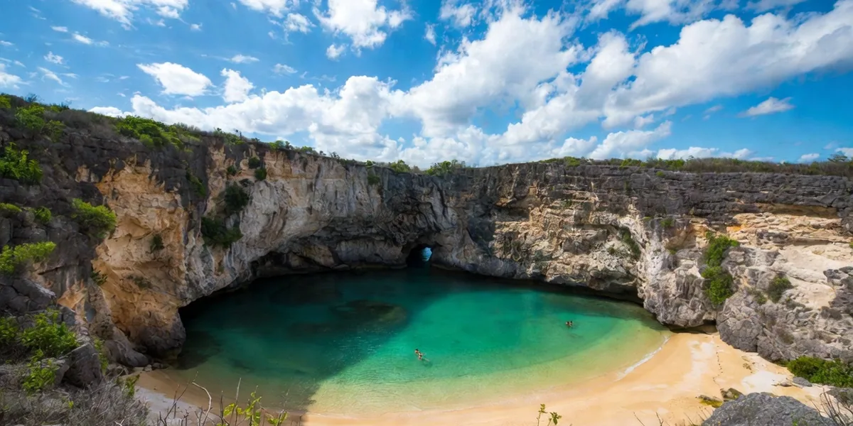 The Hidden Beach crater at the Marietas Islands — a circle of sand and swimmers open to the sky