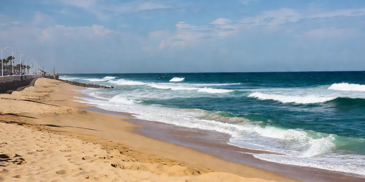 Golden sand and Pacific surf at Playa Olas Altas along the Mazatlán malecón