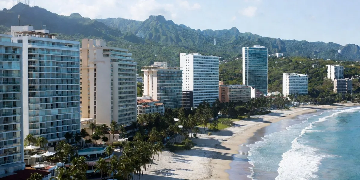 High-rise beachfront hotels lining the Puerto Vallarta Hotel Zone on Banderas Bay